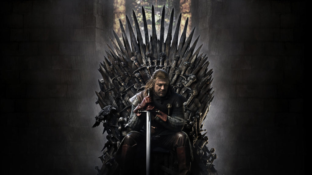 Plakat promocyjny z gry o tron. Eddard Stark siedzący na żelaznym tronie.